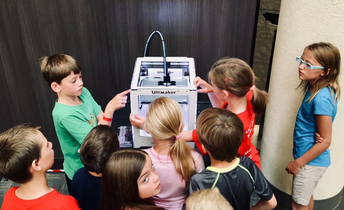Kids gather around the 3D printer to learn and createhttps://www.instagram.com/AwCreativeUT/https://www.awedcreative.com/#AwCreativeUT #awcreative #AdamWinger Adam Winger